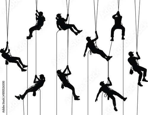 Rappelling silhouettes, rope climbing, adventure sport, mountaineering gear, helmet safety, outdoor training, vertical descent, harness technique, extreme activity, teamwork coordination