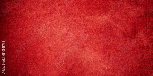 Suede leather natural red color as a background with a dark edge.