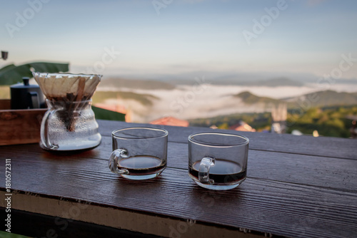 Coffee Cup on Table with Mountain View