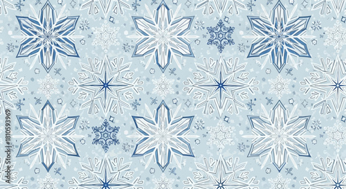 A repeating pattern of intricate snowflakes in shades of blue and white, creating a wintery design.