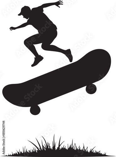 Black silhouette of skateboarder jumping over grass