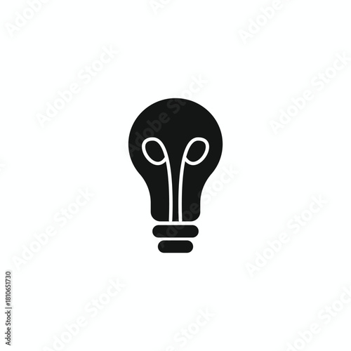 Solid black silhouette icon of a classic light bulb with an internal filament structure. Represents invention, illumination, bright ideas, and creative solutions. Simple vector graphic