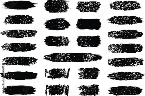 A collection of black brush strokes of various shapes and textures on a white background