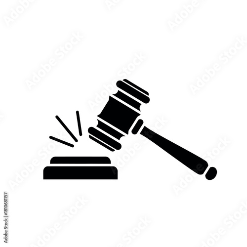 Gavel striking block legal justice concept.