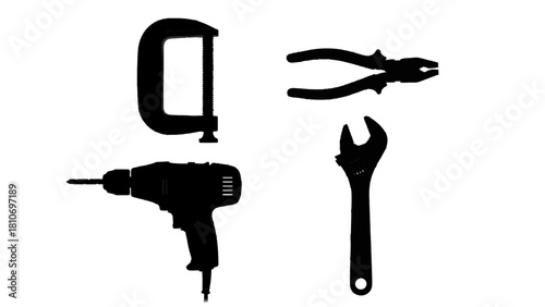 Vector illustration of silhouette collection of four essential hand tool icons including a drill, clamp, pliers, and wrench isolated on transparent background 