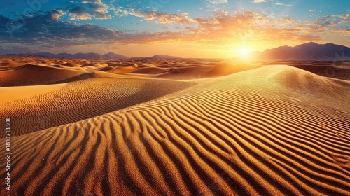 Top-down view of rippled desert sand concept. Breathtaking sunset over vast sandy dunes in a serene desert.