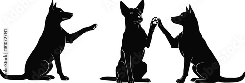 Silhouette dogs sitting and raising paws in playful interaction, training gesture, animal communication, black vector illustration for pet-themed content