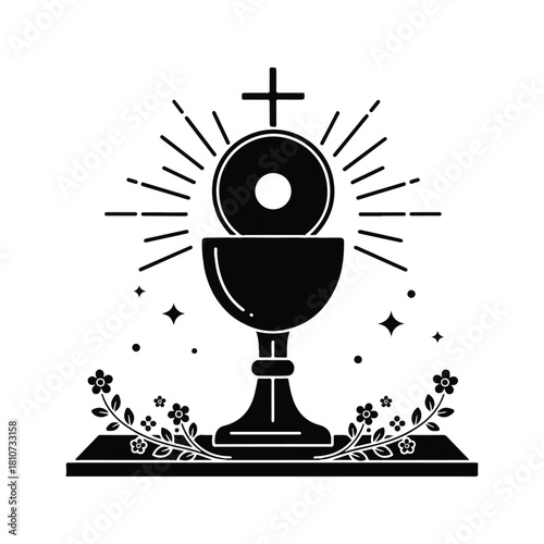 Black and white illustration of a chalice with a host, topped with a cross, radiating light, and adorned with flowers.