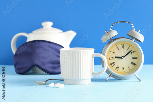 Cup of tea, alarm clock, sl...