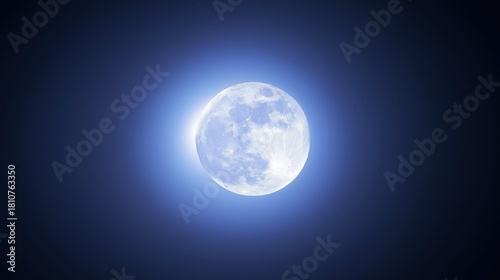 Supermoon detail. A glowing super moon with a sharply detailed lunar surface rising against a dark blue gradient night sky, astronomy, nature, and night-sky concepts.