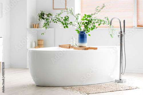 Bathtub tray and vase with ...