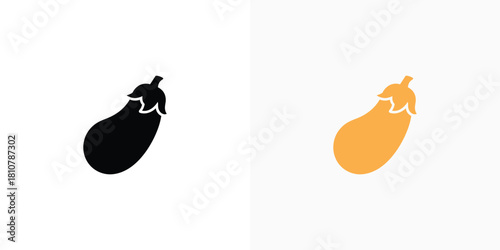 A sleek black eggplant and a warm orange eggplant are presented side by side on a minimalist white setting