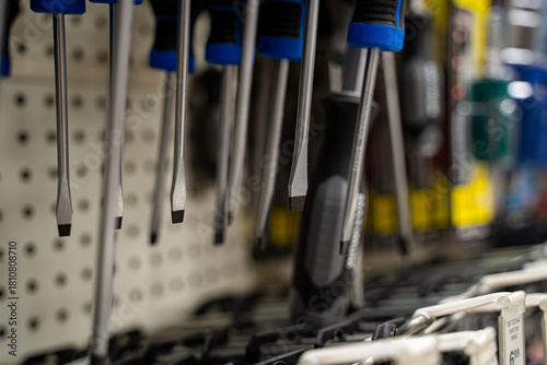 Obraz na plátně Close up of flathead screwdrivers hanging in hardware store.