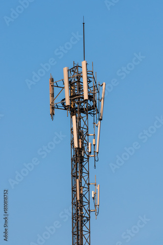 Communication tower on blue sky background