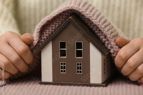 Woman in warm sweater with ...
