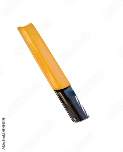 Black pet grooming stripping knife with yellow handle isolated on white