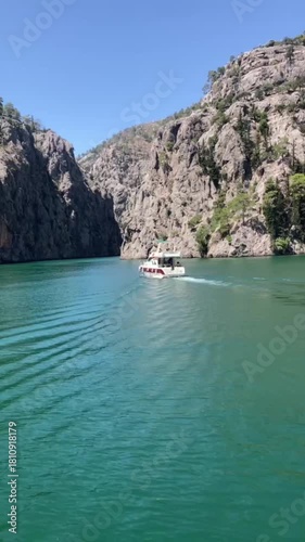 View of the lake with green water and on the mountain cliffs of the Green Canyon. Manavgat, Antalya, Turkey