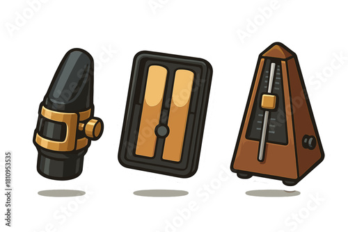 Traditional wooden metronome, saxophone mouthpiece, and instrument reeds isolated on white