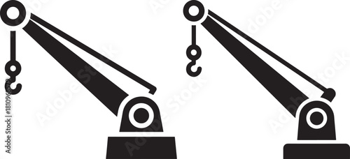 Two industrial crane arms silhouette