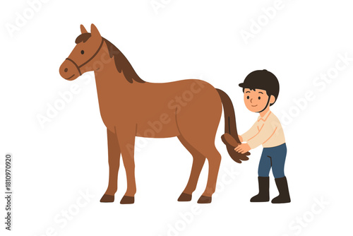 Young equestrian wearing a helmet grooming a brown horse's tail using a brush