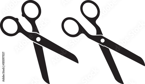 Two open scissors silhouette
