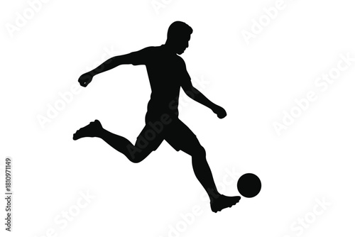 Dynamic silhouette of a male athlete kicking a soccer ball in competitive action