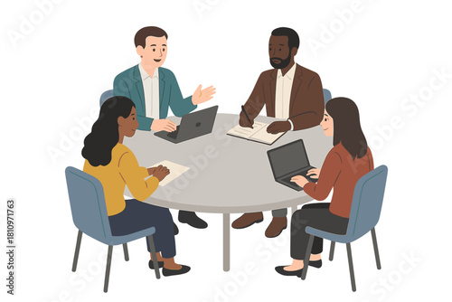 Diverse business team meeting around a table discussing work and using laptops