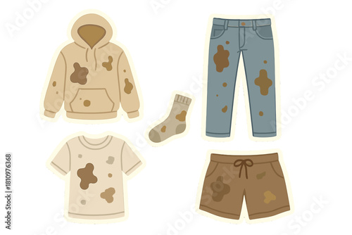 Collection of casual apparel items covered in brown mud stains