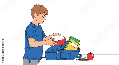 Young boy in blue shirt packing lunchbox and school supplies into a blue backpack for a new school day