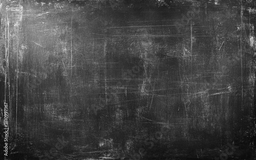 Chalk rubbed out on blackboard background. 