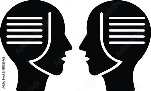 Two human heads silhouette with text bubbles representing communication