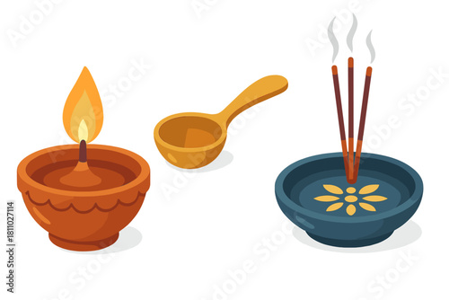 Traditional Indian ritual objects: burning diya oil lamp, wooden spoon, and incense