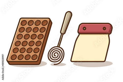 Set of essential baking tools including chocolate mold whisk and dough scraper