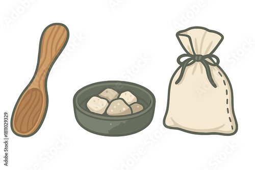 Rustic cooking ingredients set featuring a wooden spoon, bowl of dough, and tied cloth sack