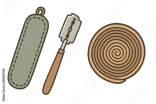 Traditional shaving kit items including a safety razor, protective pouch, and leather strop