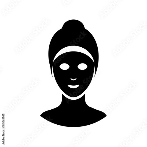 Silhouette of a woman with a facial mask and hair bun up