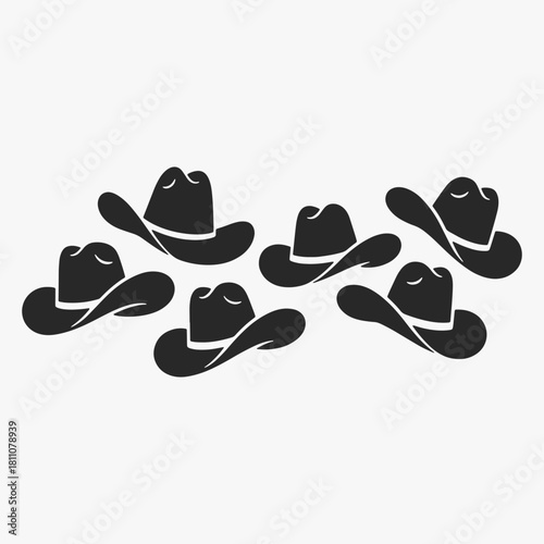 Collection of stylized cowboy hat silhouettes. They are all different sizes and shapes.