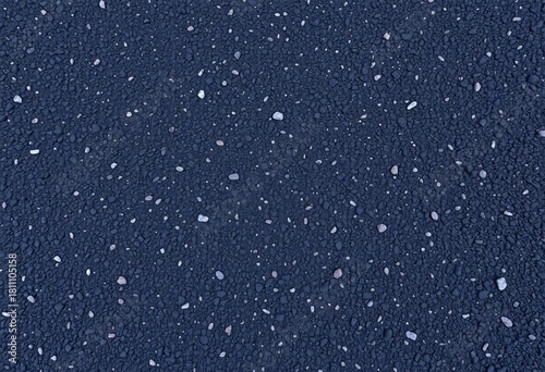 Fototapeta Naklejka Na Ścianę i Meble -  Dark, coarse-grained asphalt surface, showing texture and small stones, shadow, coarse