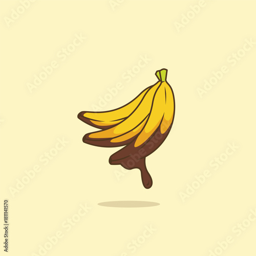 Ripe banana fruit covered with chocolate sauce dripping