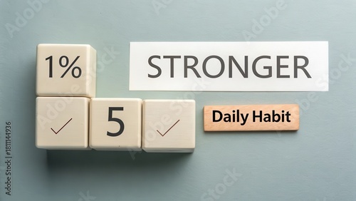 Cubes with text showing daily habits for becoming stronger