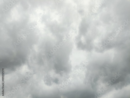 A uniform expanse of gray, cloudy sky, featuring a soft diffusion of light and varied cloud textures, indicative of an overcast weather condition.