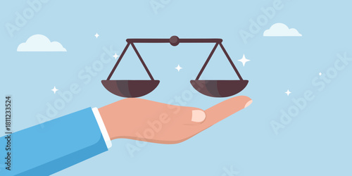 Hand holding scales of justice symbol of fairness and equality