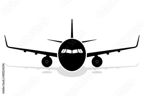 Front view of a black airplane with wings and tail fin on a white background with a soft shadow below silhouette