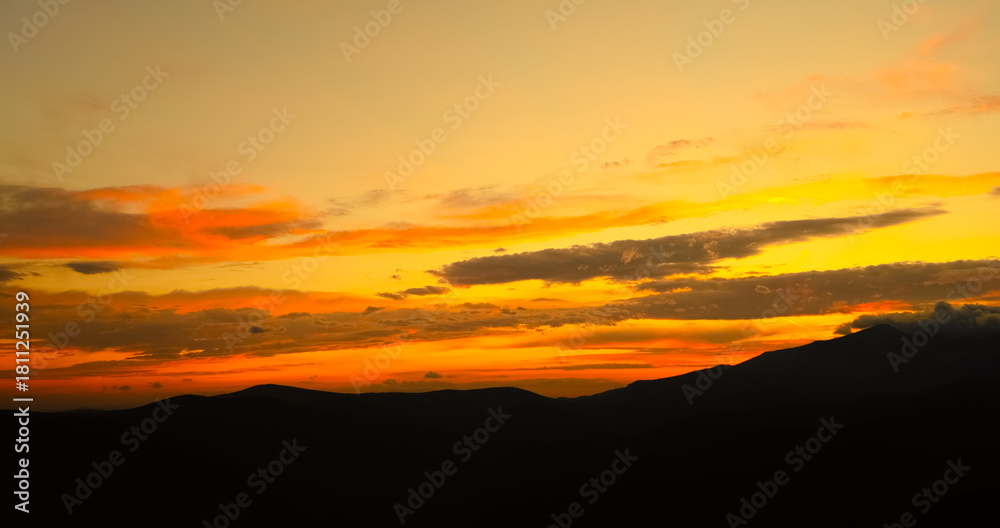 Obraz premium Sunset cloudy sky with fluffy clouds at night.