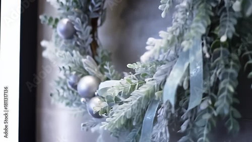 Delicate Holiday Wreath with Silver Ornaments and Soft Ribbon, festive and elegant
