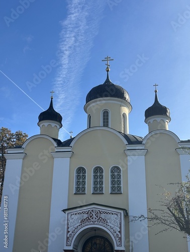 Canvas-taulu Berlin Germany October 2025 Facade of yellow Orthodox style church with three on