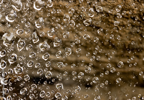 A close up of water droplets on a surface