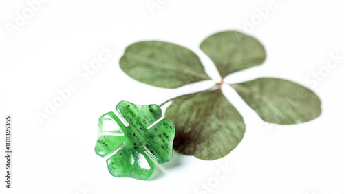 Detail of four-leaf clovers  on background