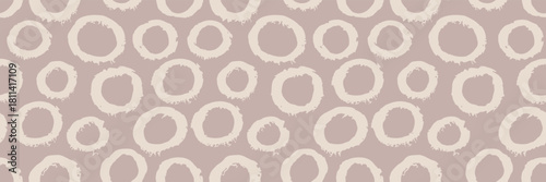 Seamless beige spot pattern with neutral leopard print and cute background.