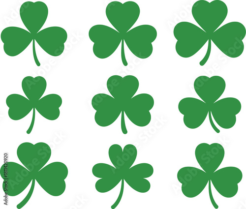 Collection of various green shamrock clover symbols representing luck and Irish heritage, isolated on a white background